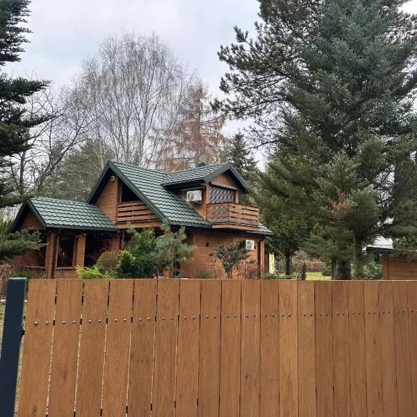 Dom letniskowy wolnostojący drewniany na wyłączność, jezioro Piaseczno 350 m, jacuzzi, hotel v destinácii Czarny Las