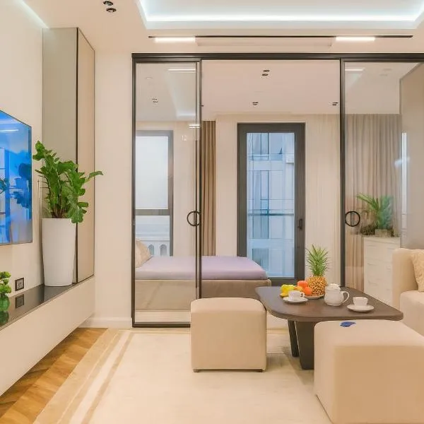 Nest One Luxe, Элитные апартаменты с балконом и видом на фонтан Tashkent City Park 110，位于塔什干的酒店