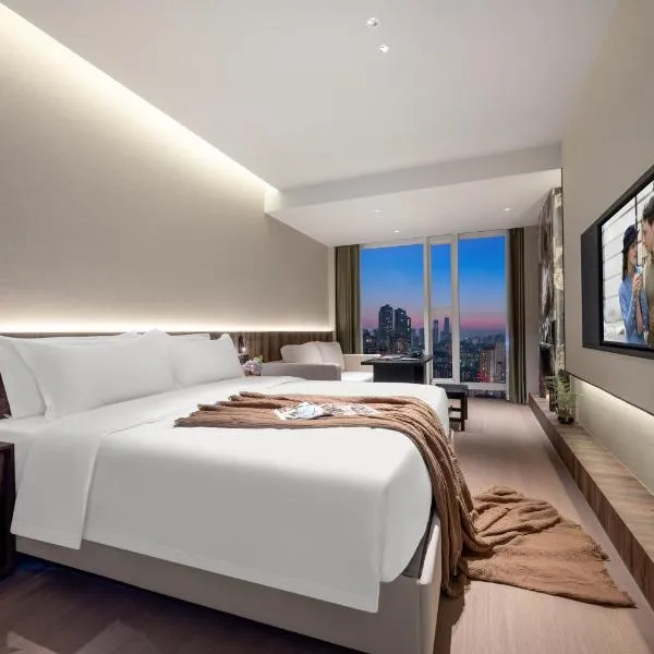 重庆伯特高空酒店江北嘴洪崖洞店Chongqing Bert High-Altitude Hotel Jiangbeizui Financial Center Branch, хотел в Чунцин