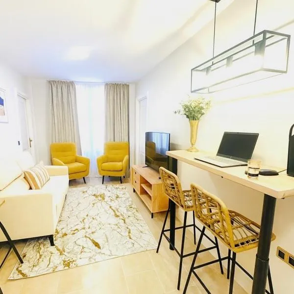 Apartamentos Puente Romano Suites Parking Gratis, hotel in Merida