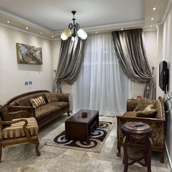 Privado Modern Apartment Garden View B11 Group114 2BR, хотел в Madinaty