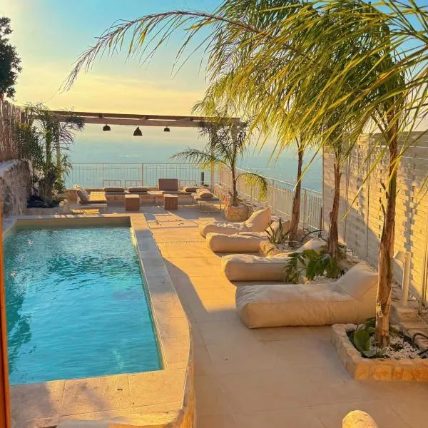 OIKOS Guesthouse & Rooftop，位于苏伊奥的酒店