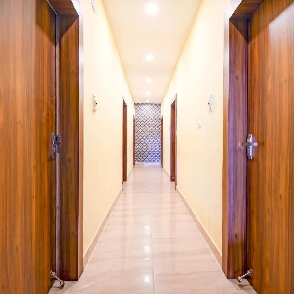 Hotel O THE WEDDING RINGS，位于丹巴德的酒店