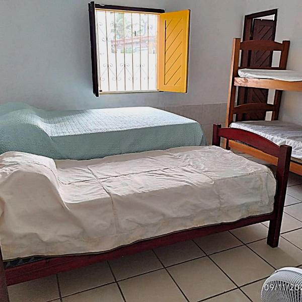 Casa espaçosa e arejada em condomínio tranquilo a poucos minutos da praia - ideal para famílias - Foto 2