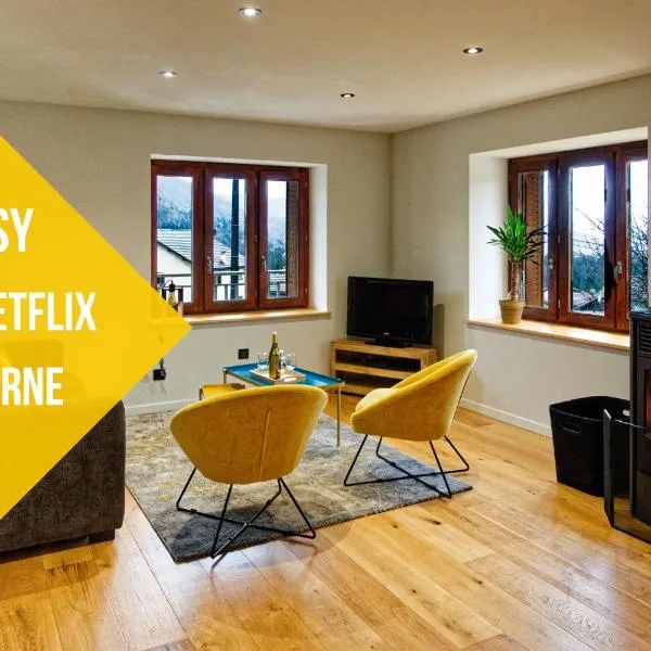 Cocon d'hiver dans le Jura - Option spa - Gîte cosy chez Ô JurassiK, hotel in Cuttura