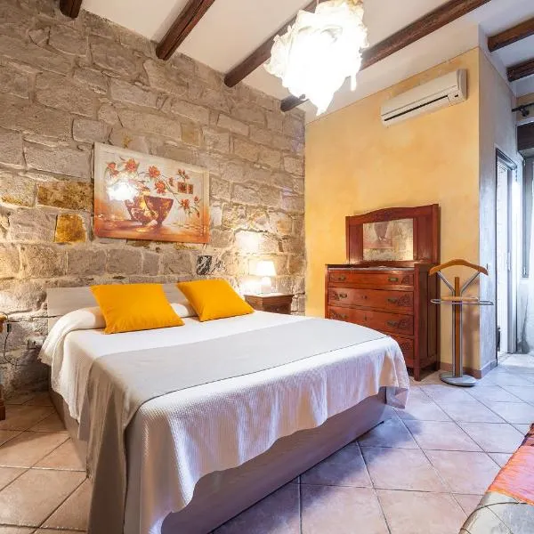 Domus de Janas Rooms Gonnesa，位于贡内萨的酒店