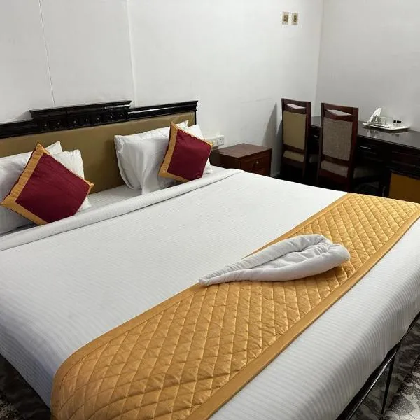 Pournami Inn, hotel a Chengannūr