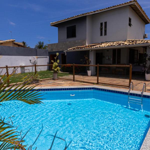 Casa com Wi-Fi, Piscina e Garagem a 550m da Praia