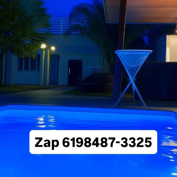 a Casa Paradisiaca lll Luxo Com Sinuca e Lavanderia com Roupa de Cama e Toalhas e Terraço com Vista à Serra de Caldas Novas, khách sạn ở Caldas Novas