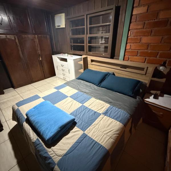 Casa Canasvieiras 2 Dormitórios a 3km do mar Sala, cozinha, 2 dormitórios, banheiro, área com churrasqueira e amplo espaço externo