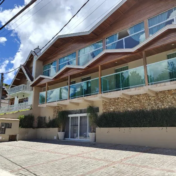 Pousada Village Serrano - 2km do Capivari, hotel i Campos do Jordão