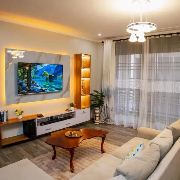 Luxury 2BR Apartment with AC, Wi Fi, Backup Power Ideal for Families , 24-7 security, Hotel in Kampala