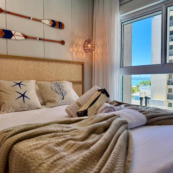 Apartamento em Condomínio Frente-Mar com Piscinas, Jacuzzi Aquecida, Sauna, Academia, Brinquedoteca, Churrasqueira na Sacada, Cozinha Completa e Lazer de Home Club - Foto 2