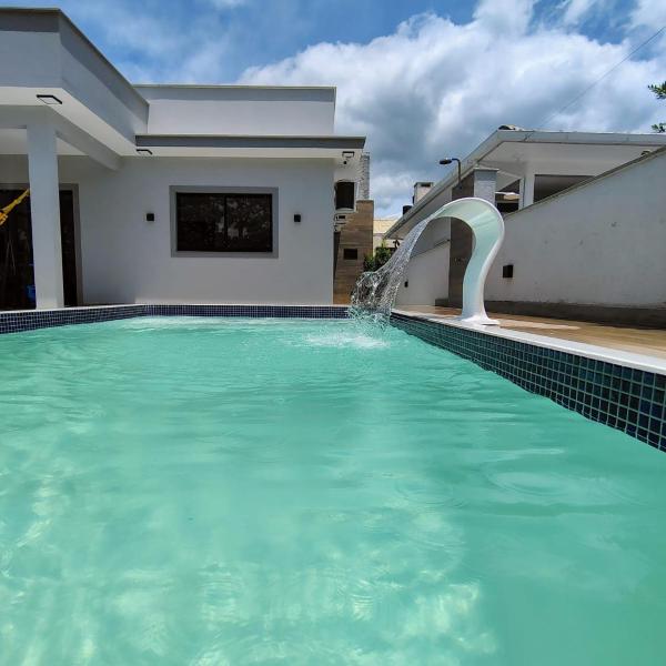 Casa com piscina praia da Pinheira - Brisa das Amendoeiras
