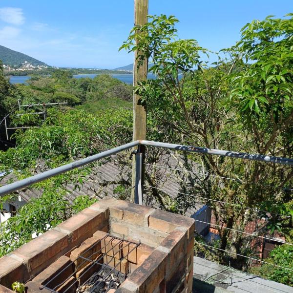 House com 2 Churrasqueiras, 3 Ar Condicionados e Muito Verde!