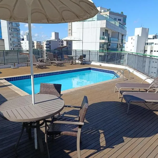 Apt 2 Qts com suite, recepção 24hrs, piscina e academia, hotel in Vitória