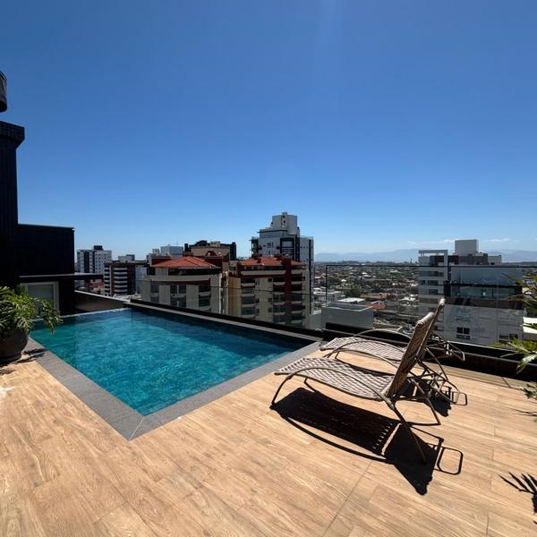 Blue Home Capão - Apto climatizado com Wi-Fi, terraço e piscina