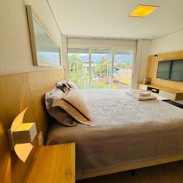 Casa com piscina, cine, churrasqueira 80m da praia - Foto 2