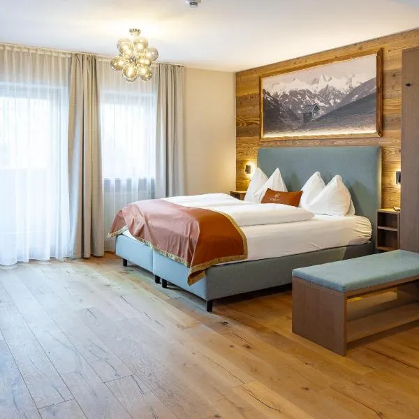 GRETI - Alpine Boutique Hotel mit Alpentherme Eintritt, reichhaltigem Frühstück, Sauna,巴特霍夫加施泰因的飯店