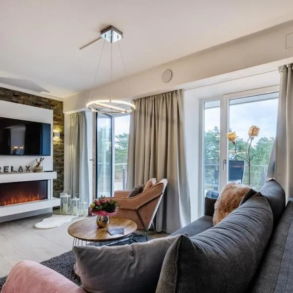Stylische FeWo direkt am Strand mit Balkon und saisonalem Strandkorb, hotel i Binz