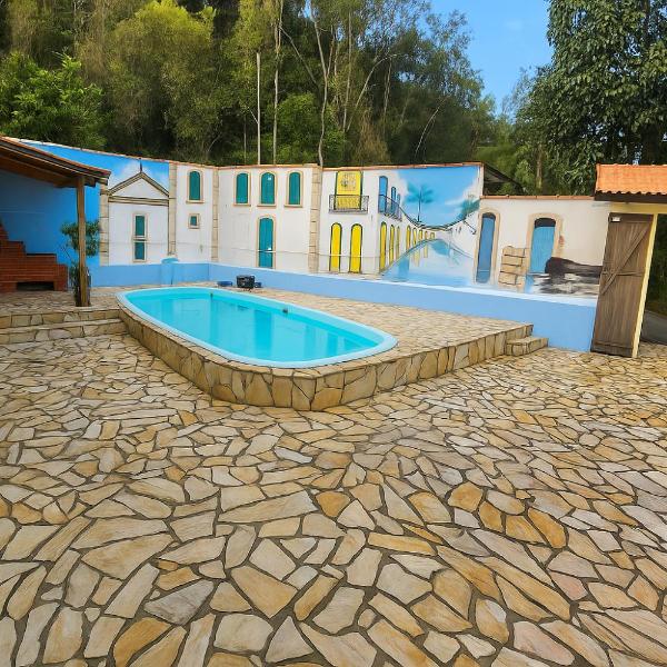 Paraty dos Sonhos com piscina e vista para a serra e ar condicionado