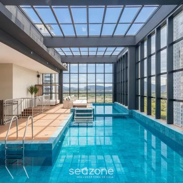 Sua estadia exclusiva a poucos passos do Mar em Meia Praia - FFS, hotel em Meia Praia