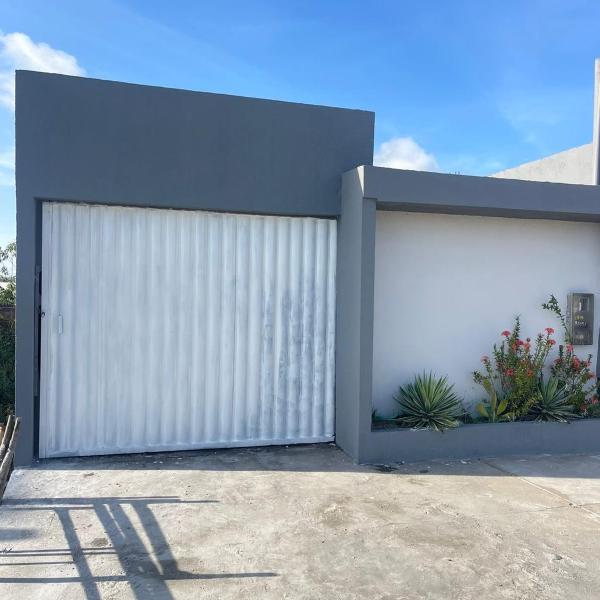 Casa pé na areia