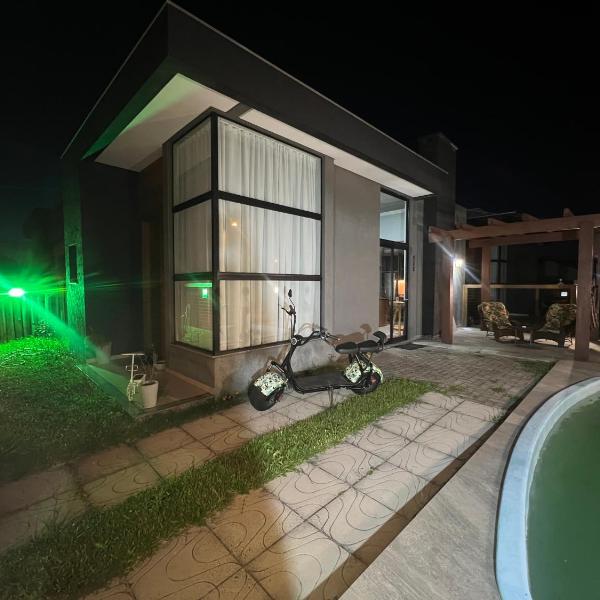 Casa com piscina em Xangri-lá