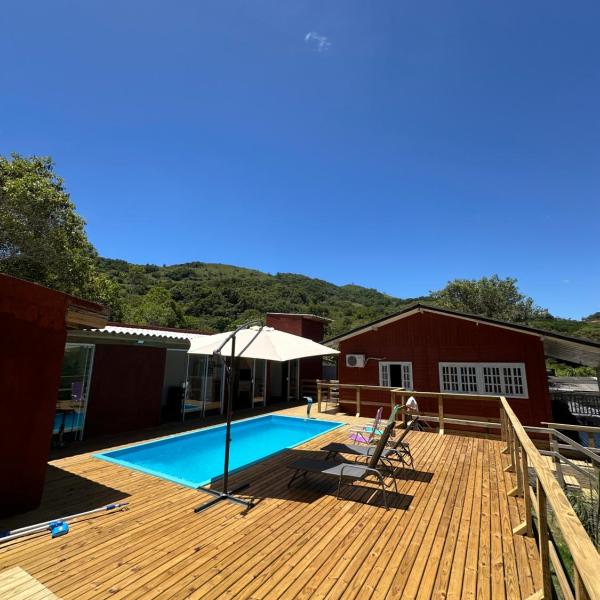 Casa com vista para a natureza e piscina