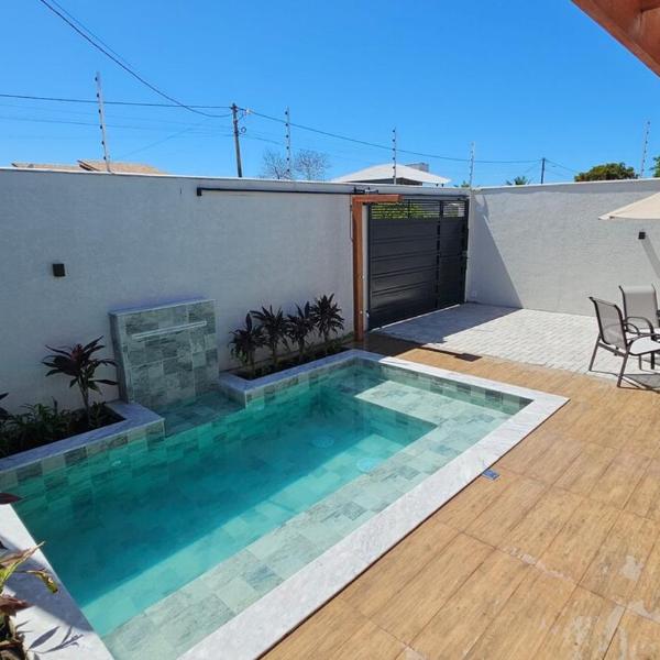 Casa espaçosa, praia, piscina e churrasqueira - Foto 4