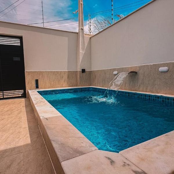 Casa 3 quartos sendo 1 suite ar Cond com piscina 300 metros da praia - Foto 4
