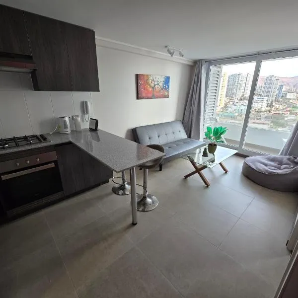 Departamento amoblado frente a la playa, hotel em Iquique