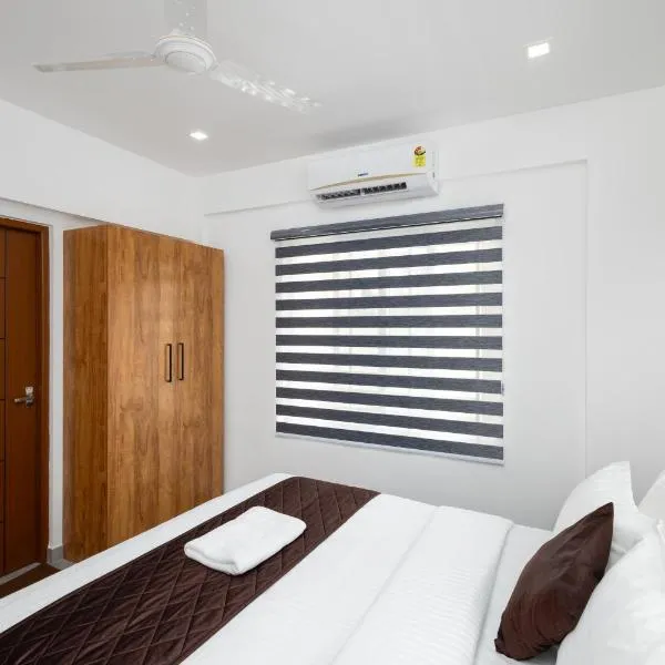 Hotel Mon Rivage Rooms and Service Apartments: Ernakulam şehrinde bir otel