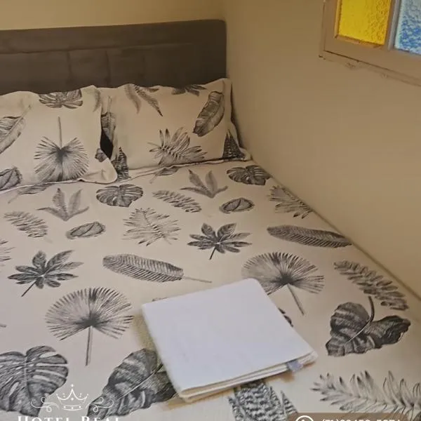 Hotel real Mariana MG Suíte com banheiro compartilhado、マリアナのホテル