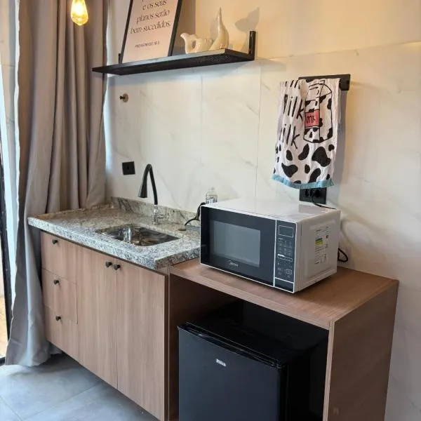 Onda Studios & Pousada - Praia da Enseada Bertioga، فندق في بيرتيوغا