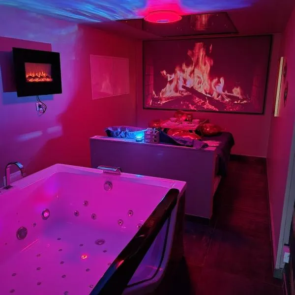 Montigny-le-Bretonneux में, होटल Le Cupidon, cocon privé avec Spa, Sauna, Cinéma Netflix et Jardin privé