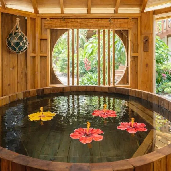 Island Breeze - Round House with BBQ - Wooden Hot Tub - Beach, hotel in Onna