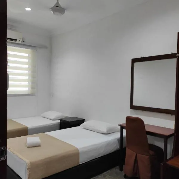 House 21, hotel en Lahad Datu