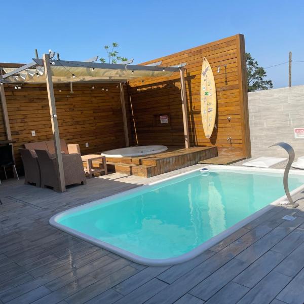 Casa com piscina e hidro, a 8 min da praia do sonho, Palhoça
