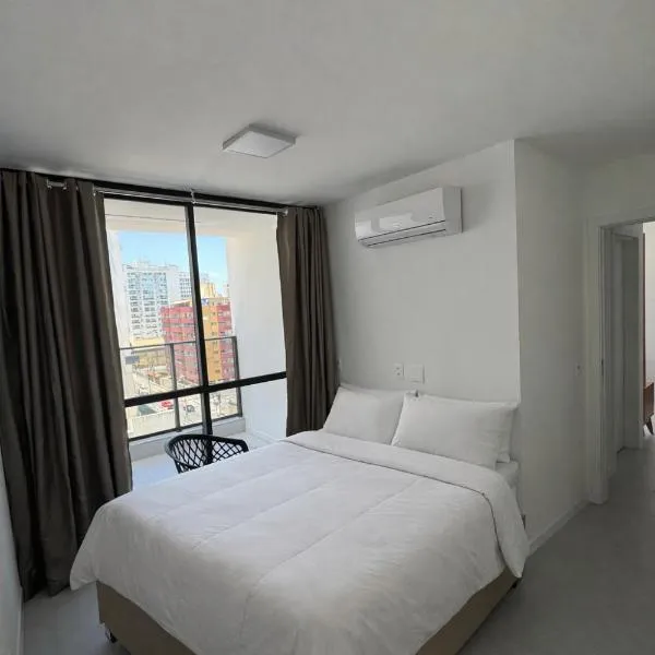 Apartamento para 6 pessoas - 1 Quadra da praia de itaparica, Hotel in Vila Velha
