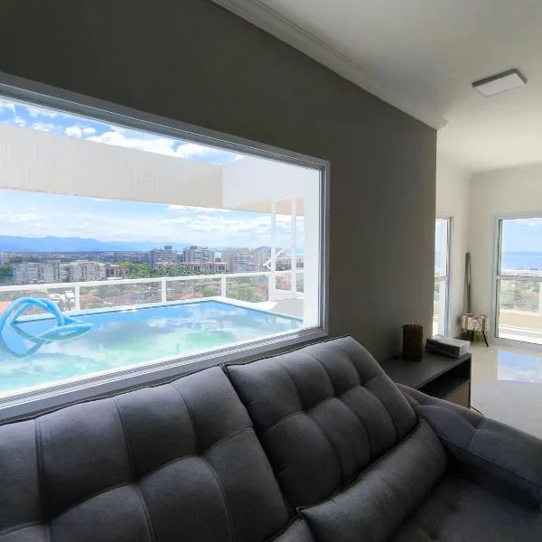 Apto Cobertura com Piscina 08 pessoas 03 dormitórios Bertioga SP Frente Mar, hotel em Bertioga