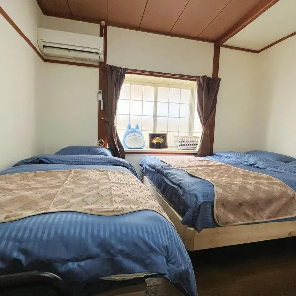 2号房 閑静な住宅街でご宿泊ください 天神博多巨蛋に直行するバスがあります, hotel en Fukuoka
