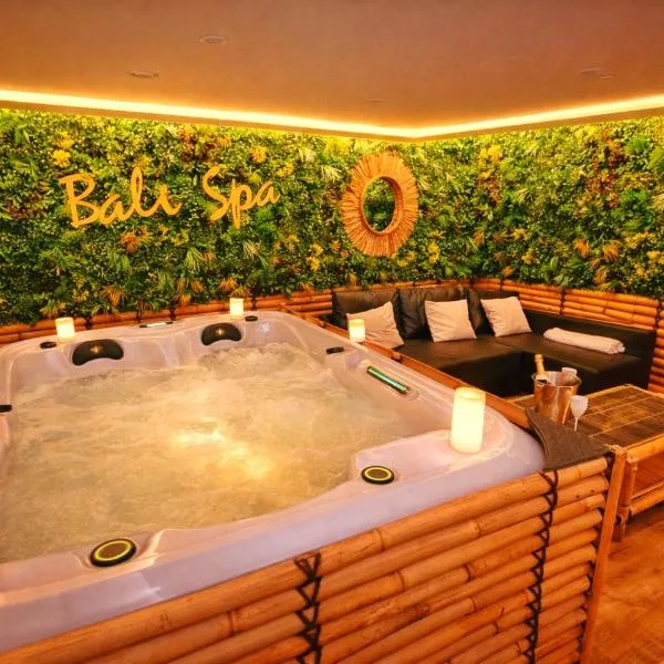 BALI SPA-4 Pers-Jacuzzi-Parking-Jardin-Clim-Colmar, hotel in Muntzenheim