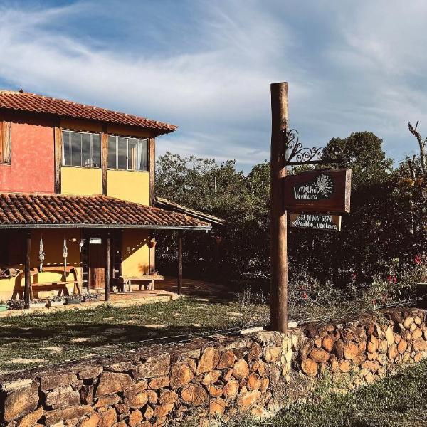 Casa charmosa com chalés, jardim e área gramada