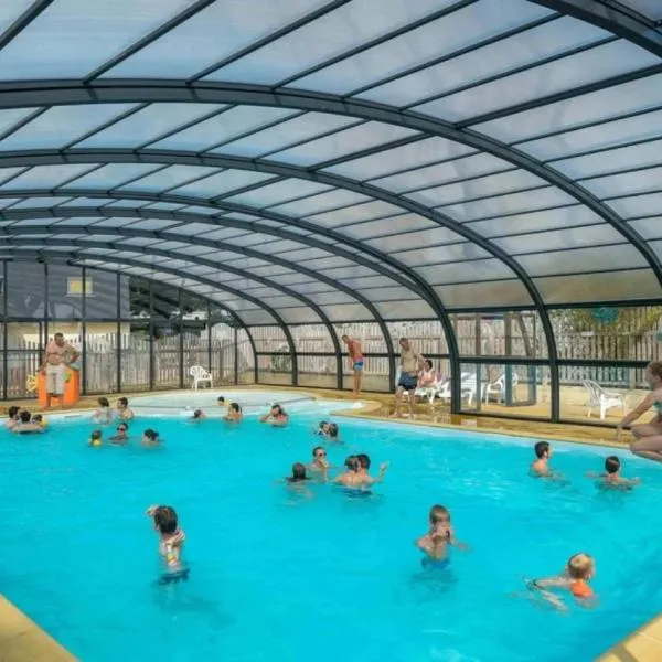 Chalet 3 étoiles - Piscine - ccbbhfa, hotel di Clohars-Carnoët