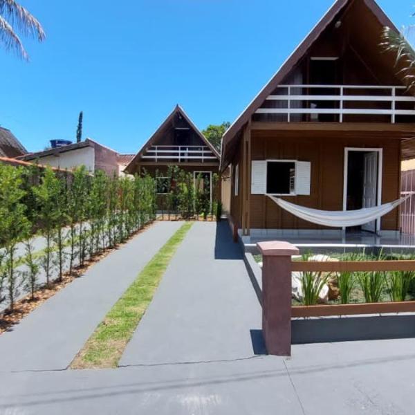 Casa na praia com piscina em condomínio frente praia