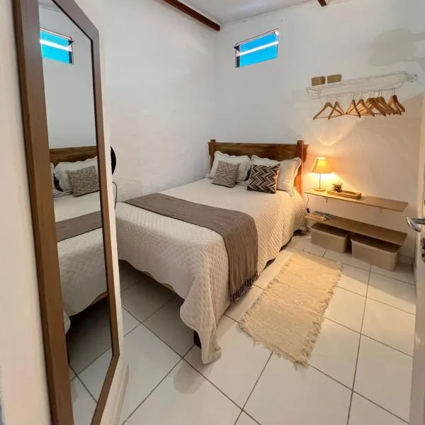 Suíte Cumuruxatiba ótima localização entrada independente à 50 metros da prainha da igreja, готель у місті Праду