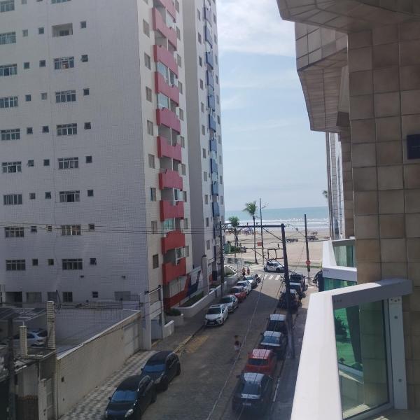 Pé na areia, praia Ocian