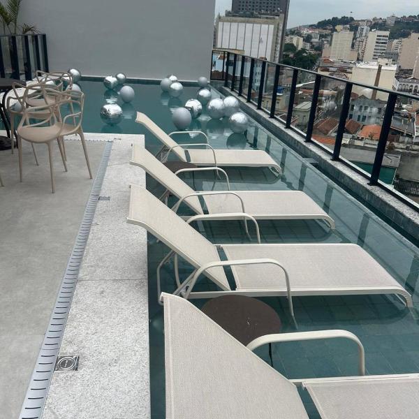 BUENO - Studio novo com rooftop, piscina e vista incrível