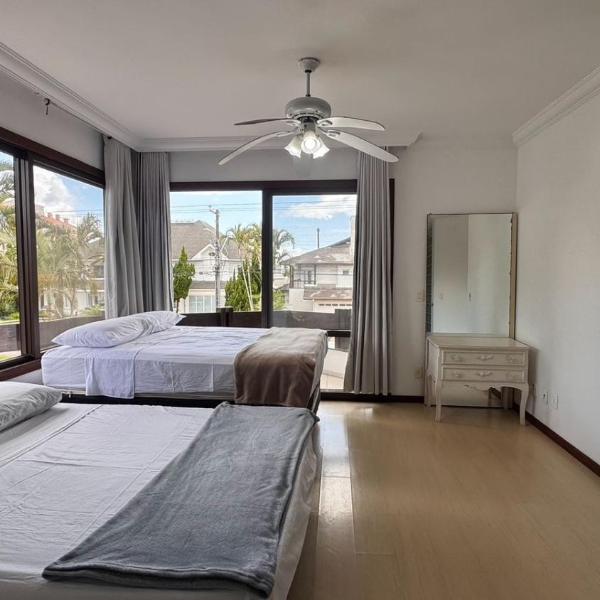 Linda casa em Jurerê internacional Capacidade 12 pessoas Av Buzios - Foto 2
